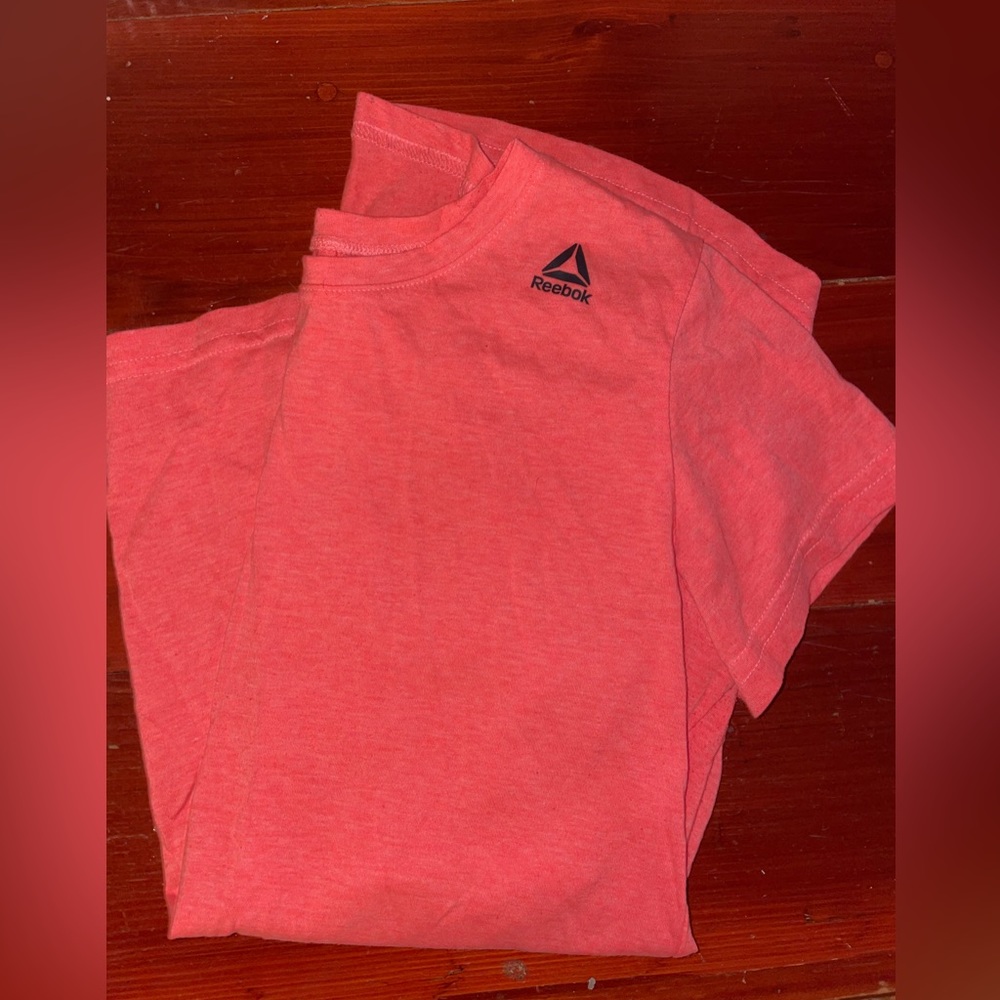 Coral pink reebok tshirt